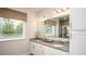 Bright bathroom features double sinks, granite counters, and a shower at Unknown Arthur Ave, Edgewater, FL 32141