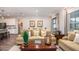Comfortable living room offers a neutral color palette and ample natural light at Unknown Arthur Ave, Edgewater, FL 32141