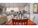 Elegant dining room features a rich wood table and chairs, perfect for Gathering gatherings at Unknown Arthur Ave, Edgewater, FL 32141