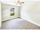 Bright bedroom with ceiling fan and carpet at 888 Old Winter Haven Rd, Auburndale, FL 33823
