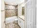 Clean bathroom, granite vanity, and tiled shower/tub at 888 Old Winter Haven Rd, Auburndale, FL 33823