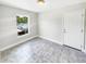 Laundry room with tile floor and exterior door at 888 Old Winter Haven Rd, Auburndale, FL 33823