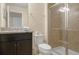 Clean bathroom with granite vanity and walk-in shower at 8924 Adriatico Ln, Kissimmee, FL 34747