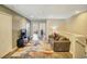 Spacious loft area with comfortable seating and a TV at 8924 Adriatico Ln, Kissimmee, FL 34747