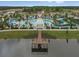 Resort-style community pool with lazy river and expansive lake views at 8924 Adriatico Ln, Kissimmee, FL 34747