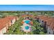 Aerial view of community pool and surrounding buildings at 5530 Metrowest Blvd # 9-211, Orlando, FL 32811