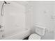 Simple bathroom with a shower/tub and white tile at 5530 Metrowest Blvd # 9-311, Orlando, FL 32811