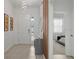 Bright entryway with gray console table and view of bedroom at 5936 High Seas Dr, Orlando, FL 32821