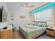 Bedroom with a queen-size bed and calming decor at 5936 High Seas Dr, Orlando, FL 32821