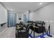Home theater with black recliner seating and large screen at 5936 High Seas Dr, Orlando, FL 32821