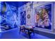 Star Wars themed game room with air hockey and pool table at 5936 High Seas Dr, Orlando, FL 32821