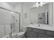 Clean bathroom with a walk-in shower and modern vanity at 5936 High Seas Dr, Orlando, FL 32821