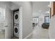 Stackable washer and dryer in a convenient laundry closet at 5936 High Seas Dr, Orlando, FL 32821