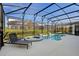 Inviting pool and spa with screened enclosure at 5936 High Seas Dr, Orlando, FL 32821