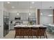 Modern kitchen with gray cabinets and stainless steel appliances at 5936 High Seas Dr, Orlando, FL 32821