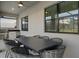 Outdoor kitchen with grill and seating area at 5936 High Seas Dr, Orlando, FL 32821