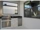 Stainless steel outdoor kitchen with sink and fridge at 5936 High Seas Dr, Orlando, FL 32821