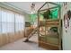 Jungle-themed bedroom with bunk beds and slide at 5936 High Seas Dr, Orlando, FL 32821