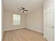 Spacious bedroom with neutral walls and vinyl flooring at 6451 Old Park Ln # 110, Orlando, FL 32835