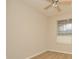 Bright bedroom with neutral walls and a window with blinds at 6451 Old Park Ln # 110, Orlando, FL 32835