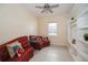 Cozy living room with built-in shelving and a comfortable sofa at 4909 W Fountainwood Dr, St Cloud, FL 34772