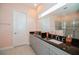 Elegant bathroom with granite countertops and a walk-in shower at 4909 W Fountainwood Dr, St Cloud, FL 34772