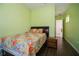 Charming bedroom with hardwood floors and a window at 4909 W Fountainwood Dr, St Cloud, FL 34772