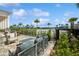 Resort-style pool area with patio furniture and stunning water views at 4909 W Fountainwood Dr, St Cloud, FL 34772