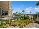 Relaxing pool area with patio furniture and lush landscaping at 4909 W Fountainwood Dr, St Cloud, FL 34772