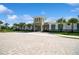 Community clubhouse with ample parking and inviting exterior at 4909 W Fountainwood Dr, St Cloud, FL 34772