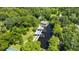 Waterfront dock with shaded seating areas and a gazebo at 1406 S Hoagland Blvd, Kissimmee, FL 34746