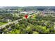 Aerial view showing property location near a river and other houses at 1406 S Hoagland Blvd, Kissimmee, FL 34746