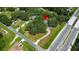 Aerial view showing property location near roads and trees at 1406 S Hoagland Blvd, Kissimmee, FL 34746
