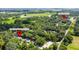 Aerial view showing property location near park and waterway at 1406 S Hoagland Blvd, Kissimmee, FL 34746