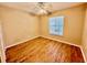 Bright bedroom with wood-look flooring at 125 Reserve Cir # 205, Oviedo, FL 32765