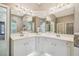 Double vanity bathroom with modern sinks and bright lighting at 445 Hightower Dr, Debary, FL 32713