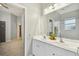 Double vanity bathroom with access to bedroom at 445 Hightower Dr, Debary, FL 32713