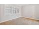 Simple bedroom with carpeting and window shutters at 445 Hightower Dr, Debary, FL 32713