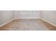 Neutral-toned bedroom with carpet flooring and window at 445 Hightower Dr, Debary, FL 32713