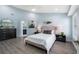 Spacious bedroom with light blue walls, and a neutral color scheme at 713 Silversmith Cir, Lake Mary, FL 32746