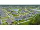 Aerial view of a new Florida neighborhood with houses and solar panels at 340 Citrine Loop, Kissimmee, FL 34758