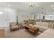 Open living room featuring a neutral color palette and comfortable seating at 1676 Tropical Palms Cir, Kissimmee, FL 34747