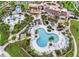 Community features resort-style pool, water park, and expansive green spaces at 1676 Tropical Palms Cir, Kissimmee, FL 34747