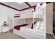 bedroom with bunk beds and jungle-themed wall at 1676 Tropical Palms Cir, Kissimmee, FL 34747