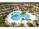 Enjoy resort-style pool with expansive deck and lounge areas at 1676 Tropical Palms Cir, Kissimmee, FL 34747