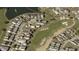 Aerial view showcasing home's location in a golf course community at 1535 Corolla Ct, Reunion, FL 34747