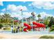 Resort-style water park with slides and play features at 1535 Corolla Ct, Reunion, FL 34747