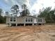 Single wide manufactured home on a dirt foundation at 18955 Se 107Th Pl, Ocklawaha, FL 32179
