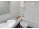 Clean bathroom with a tub, toilet, and vanity at 18955 Se 107Th Pl, Ocklawaha, FL 32179
