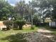 Large backyard with home and storage trailer at 158 W Magnolia St, Oviedo, FL 32765